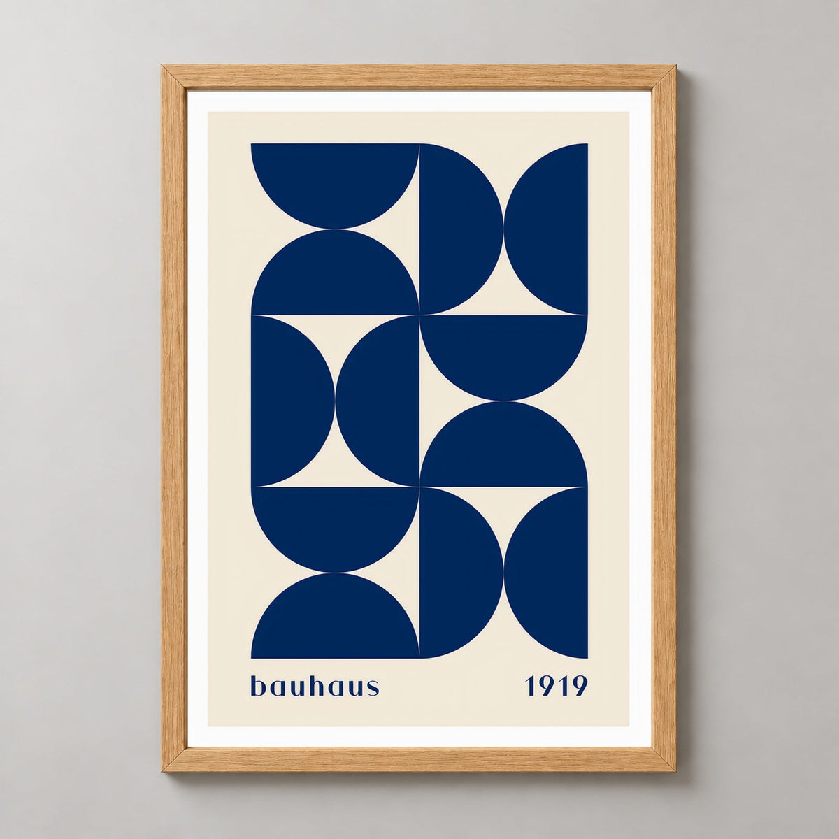 Bauhaus 1919 - Minimalist Geometric Art Print — realistic natural wood frame studio view