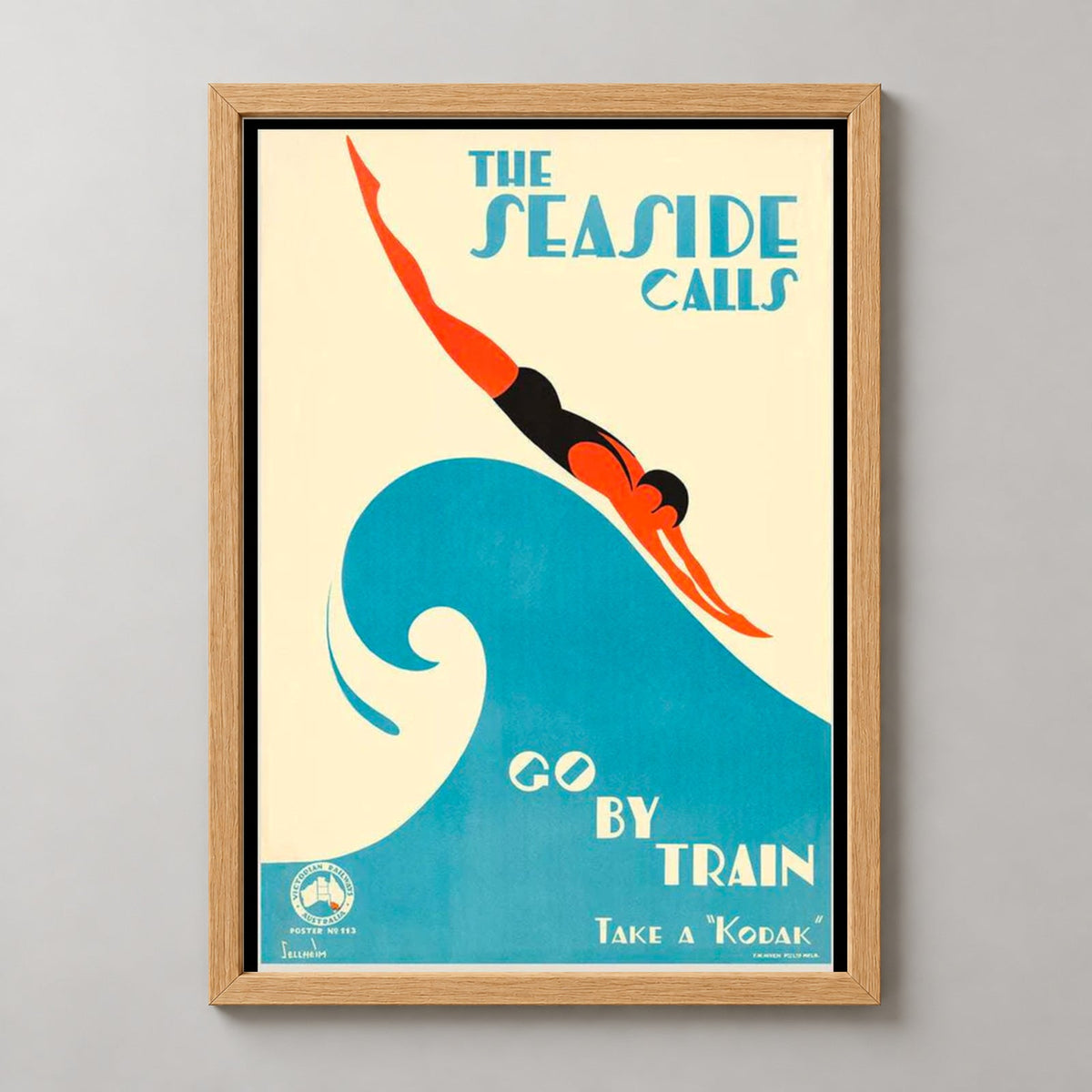 The Seaside Calls Vintage Travel Poster - 1930s Australian Art Print — realistic natural wood frame studio view
