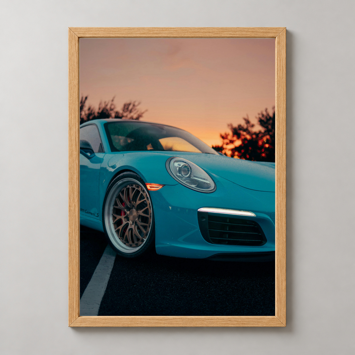 Blue Sports Car at Sunset - Modern Automotive Art Print — realistic natural wood frame studio view