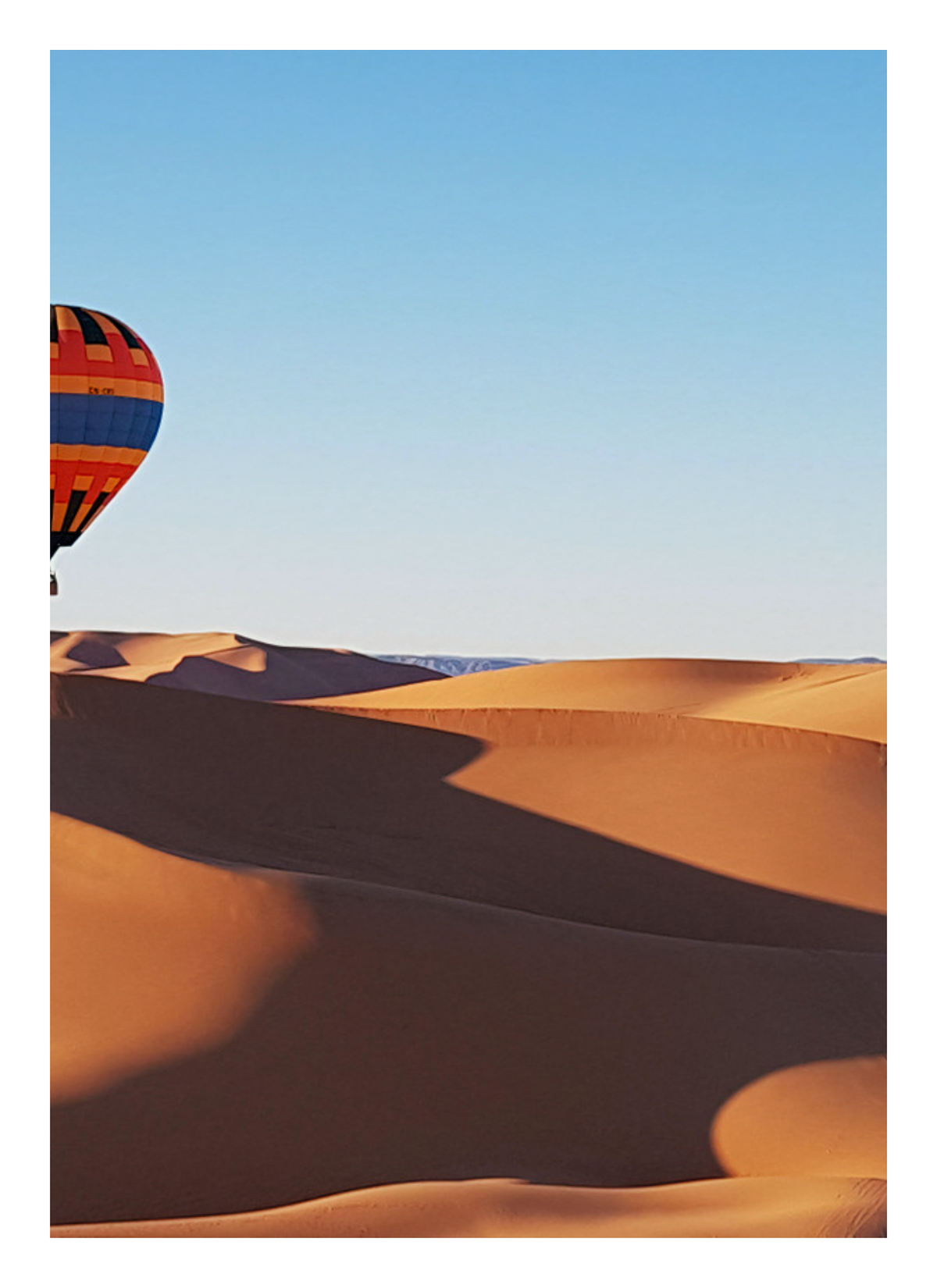 Vibrant Hot Air Balloons Over Desert Landscape Art Print — poster only, complete unframed artwork with white border