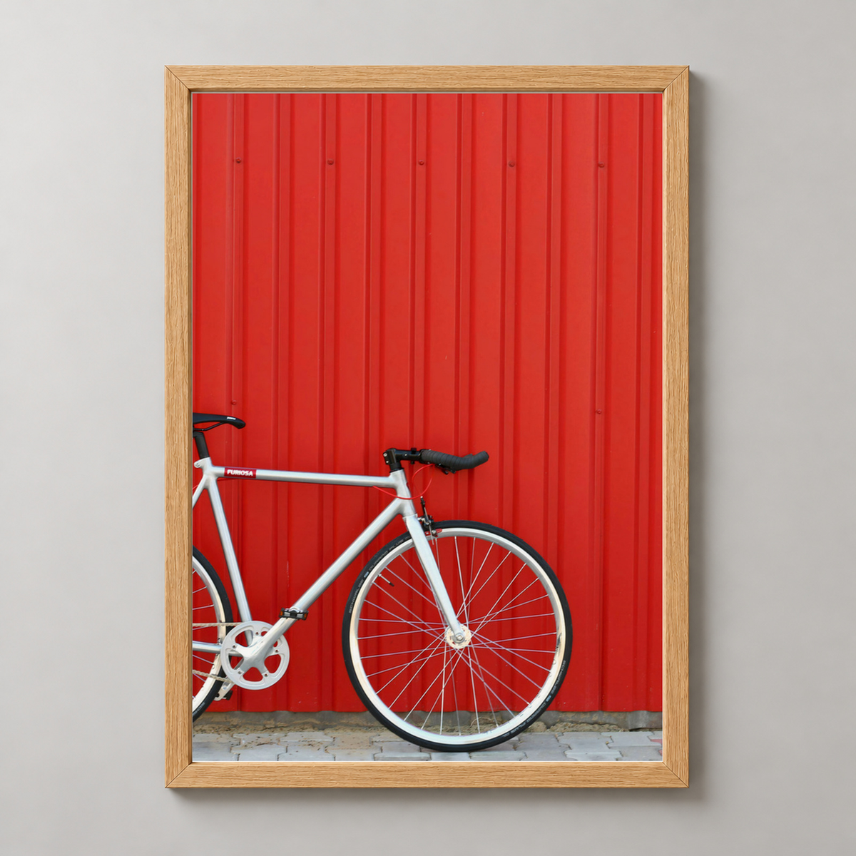 Modern Minimalist Bicycle Against Red Wall Art Print — realistic natural wood frame studio view