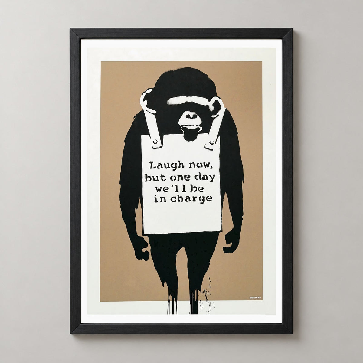 Banksy Laugh Now, 2003 — realistic black frame studio view