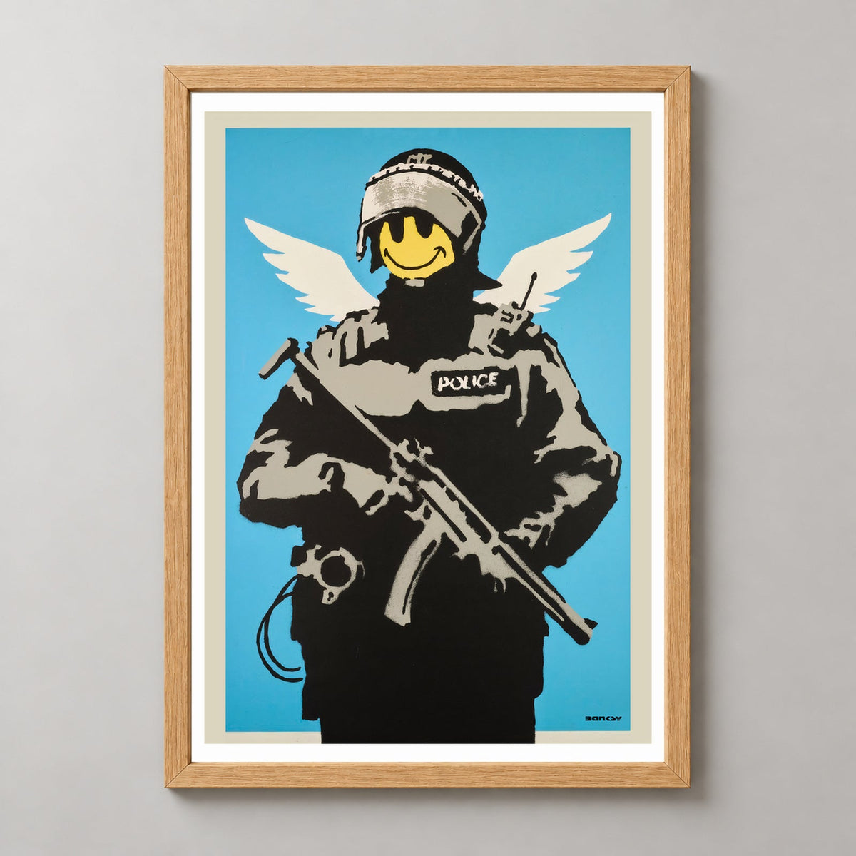 Banksy Flying Copper, 2003 — realistic natural wood frame studio view