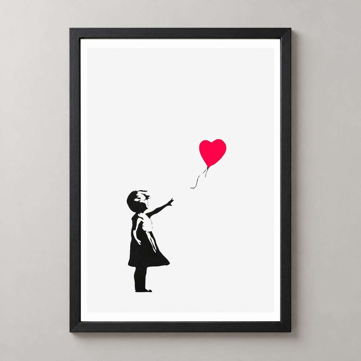 Banksy Girl With Balloon, 2004 — realistic black frame studio view