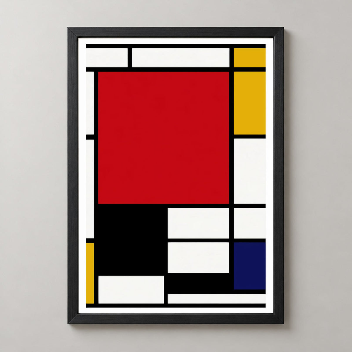 Piet Mondrian composition artwork print with large red pane, yellow, black and blue — realistic black frame studio view