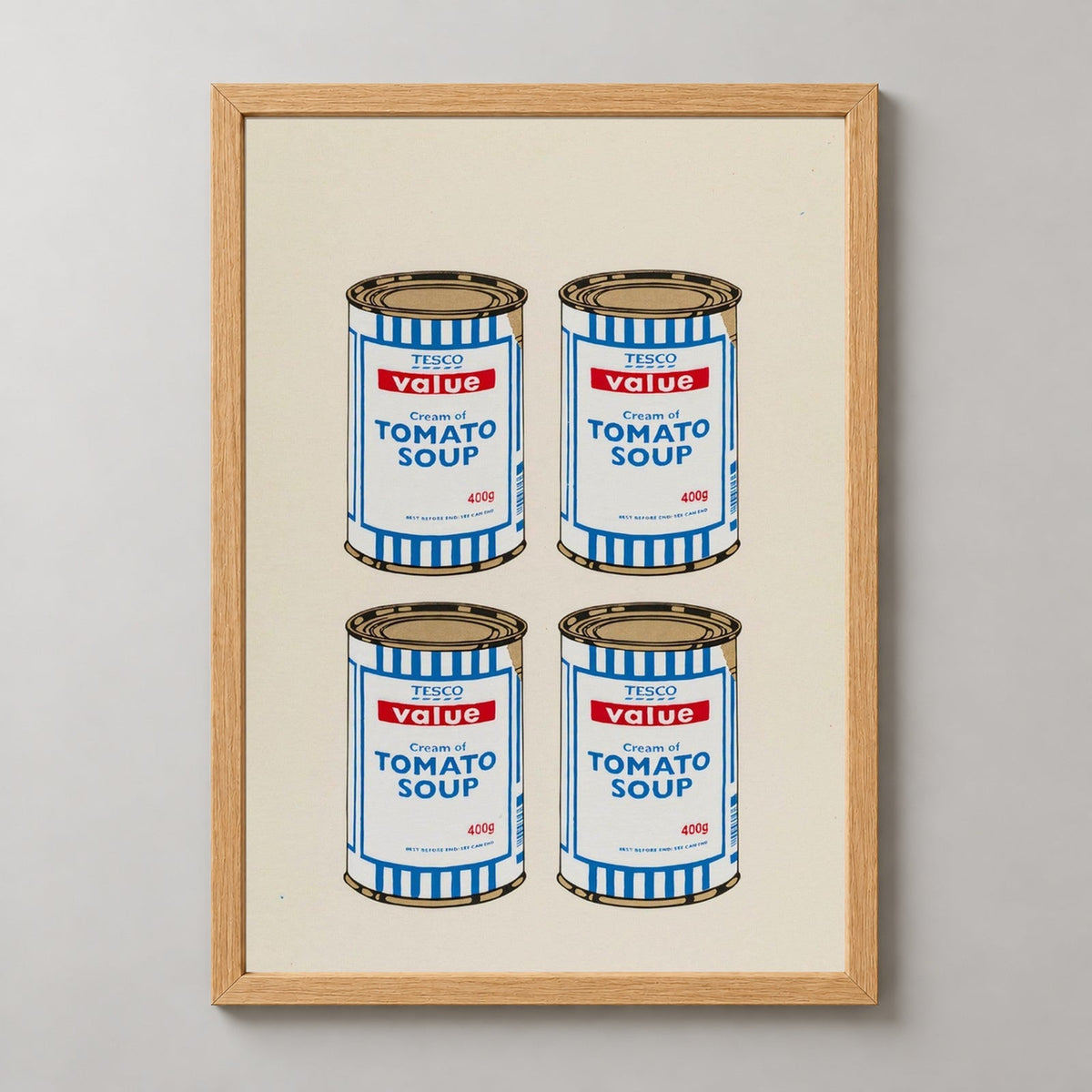 Banksy Four Soup Cans - Gold on Cream, 2005 — realistic natural wood frame studio view