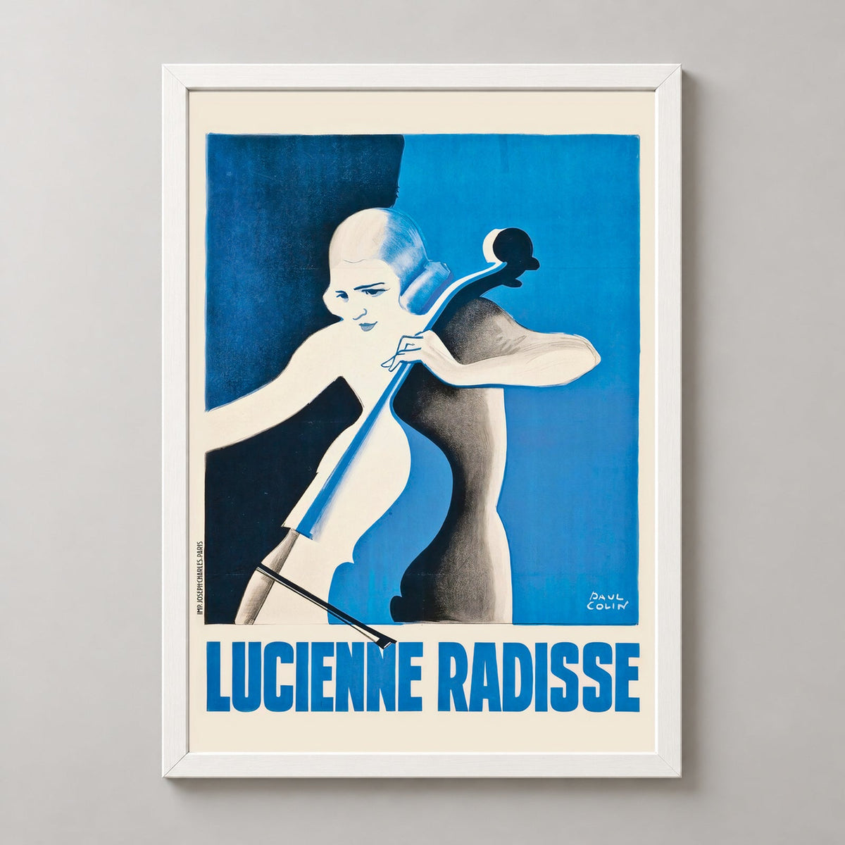 Lucienne Radisse by Paul Colin Vintage Art Deco Poster — realistic white frame studio view