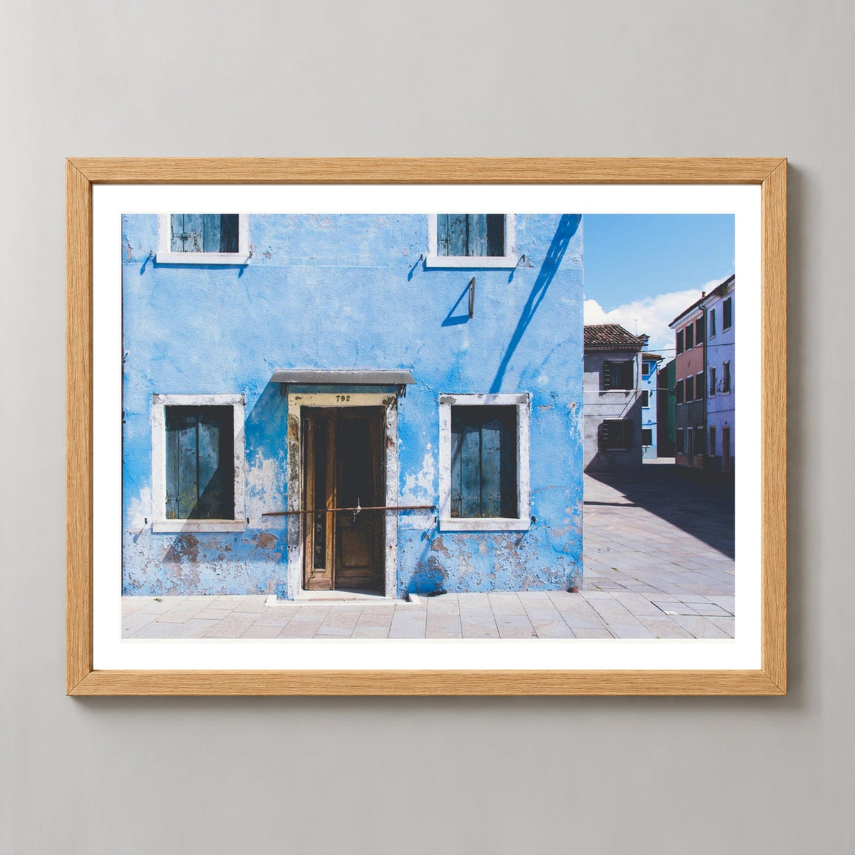 Burano Island | Venice Italy — realistic natural wood frame studio view with white border