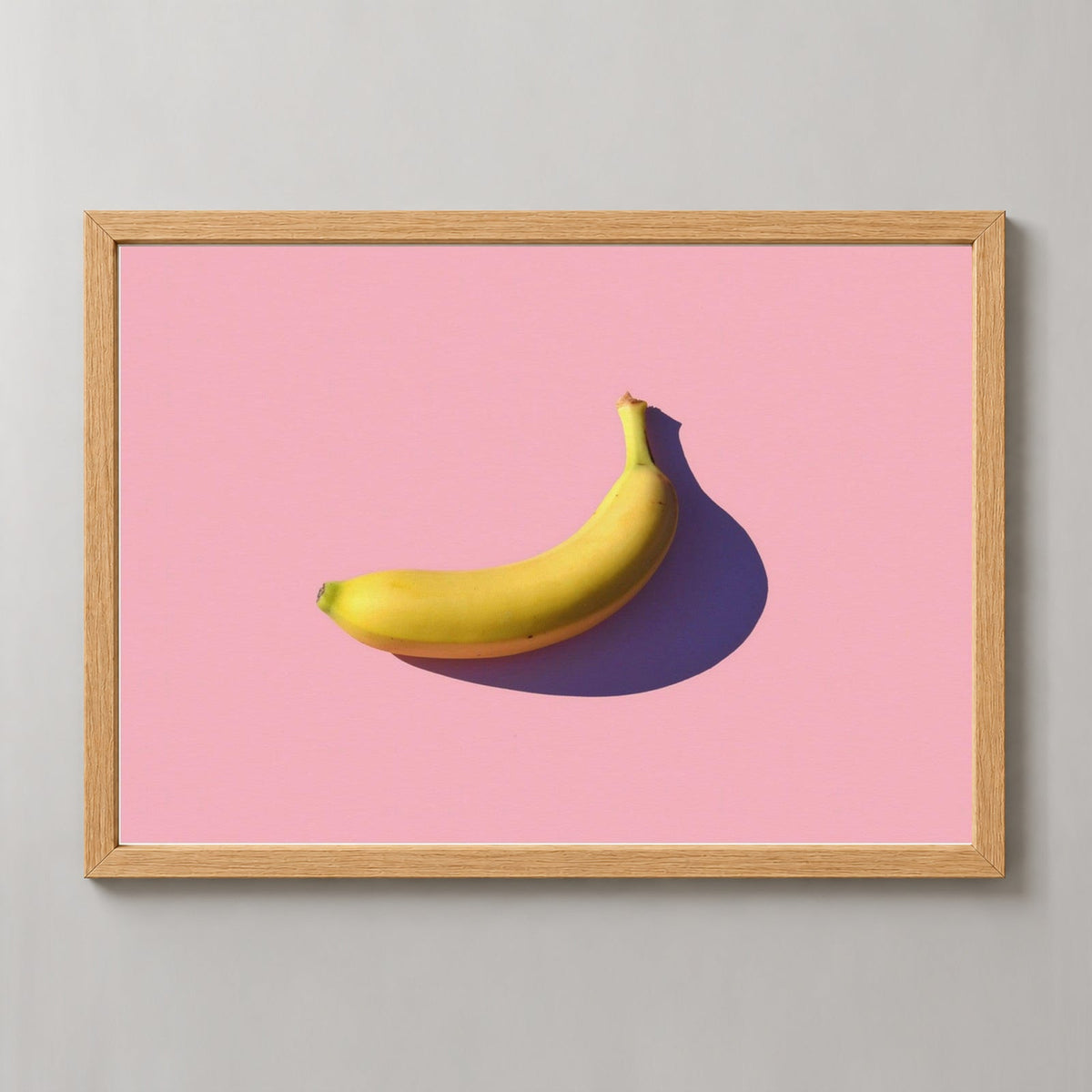 Minimal Banana — realistic natural wood frame studio view