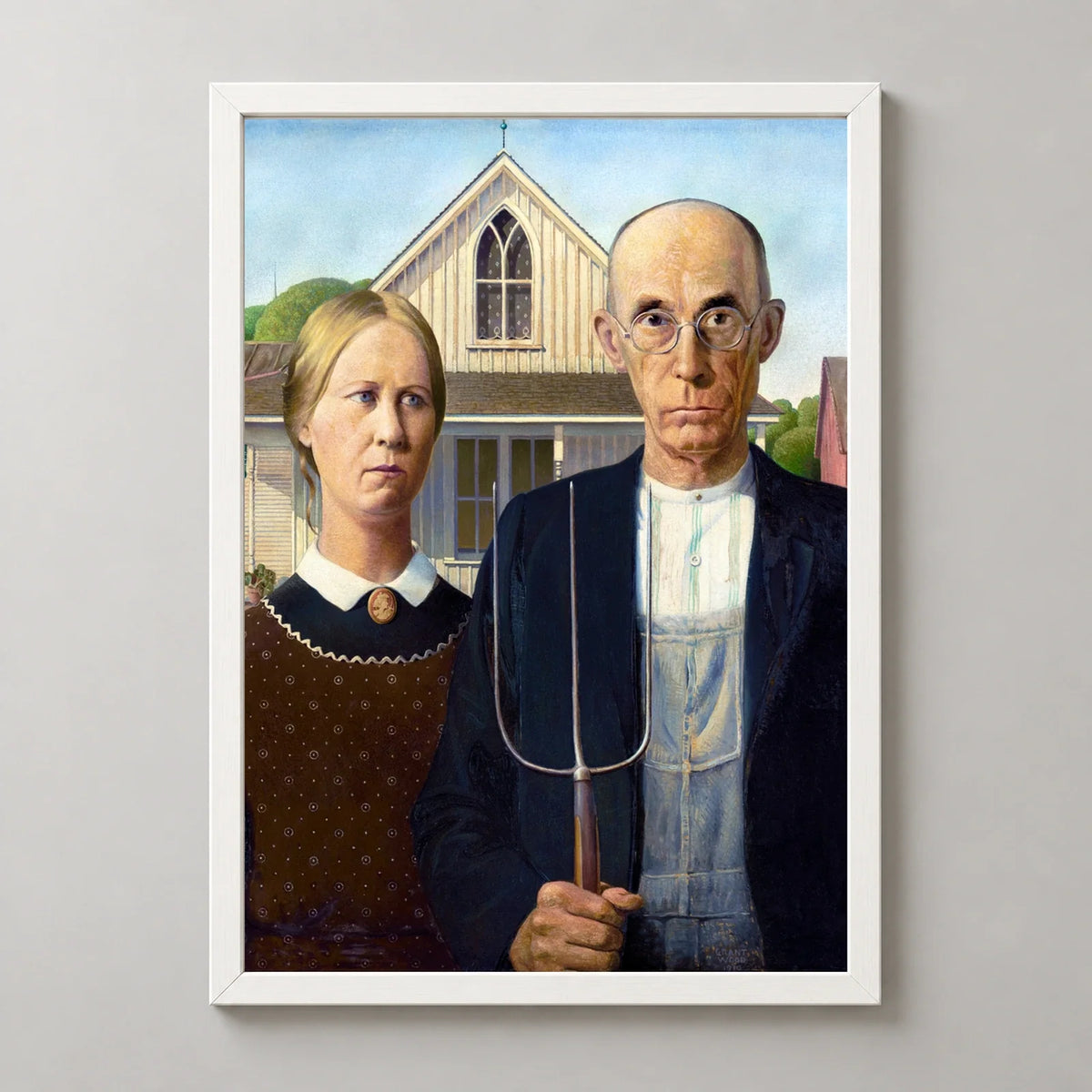 American Gothic Art Print by Grant Wood in a white frame, front view