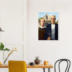 American Gothic in a white frame above a dining table; styled room mockup