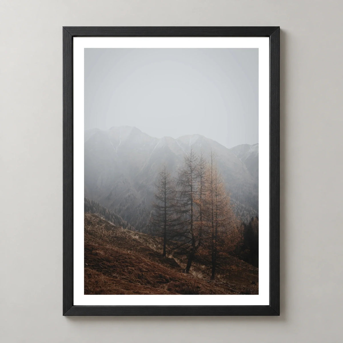 Autumn Mist Mountain Forest Photographic Print — realistic black frame studio view with white border