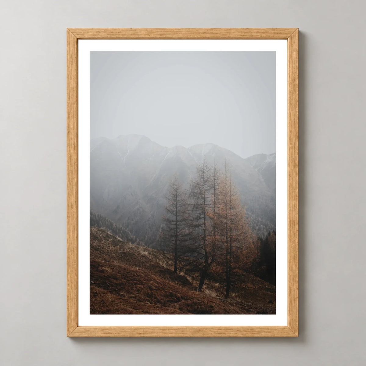Autumn Mist Mountain Forest Photographic Print — realistic natural wood frame studio view with white border