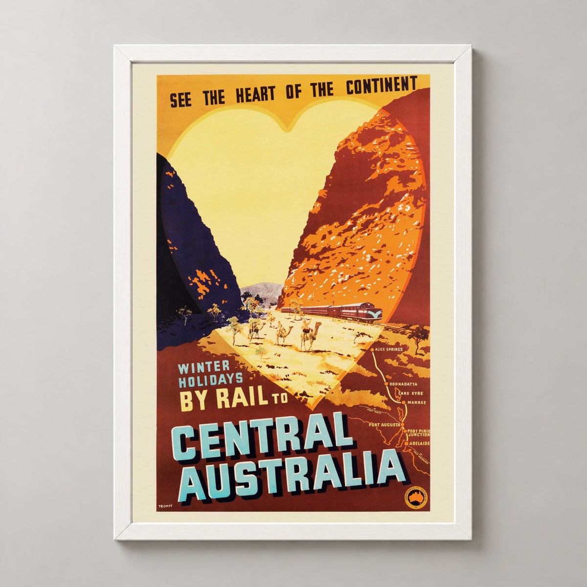Winter Holidays By Rail | Central Australia Vintage Poster — realistic white frame studio view