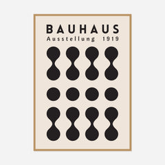 Bauhaus Black Hourglass Rhythm — front view in a natural wood frame