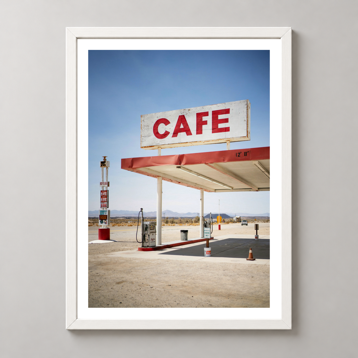 Retro Desert Cafe and Gas Station Art Print — realistic white frame studio view with white border