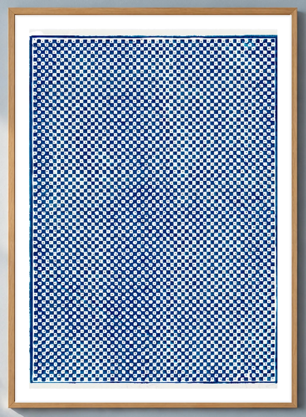 Blue Checkerboard Vintage Pattern Print by Pierre-Fiacre Perdoux in a natural wood frame; close-up of the framed artwork.