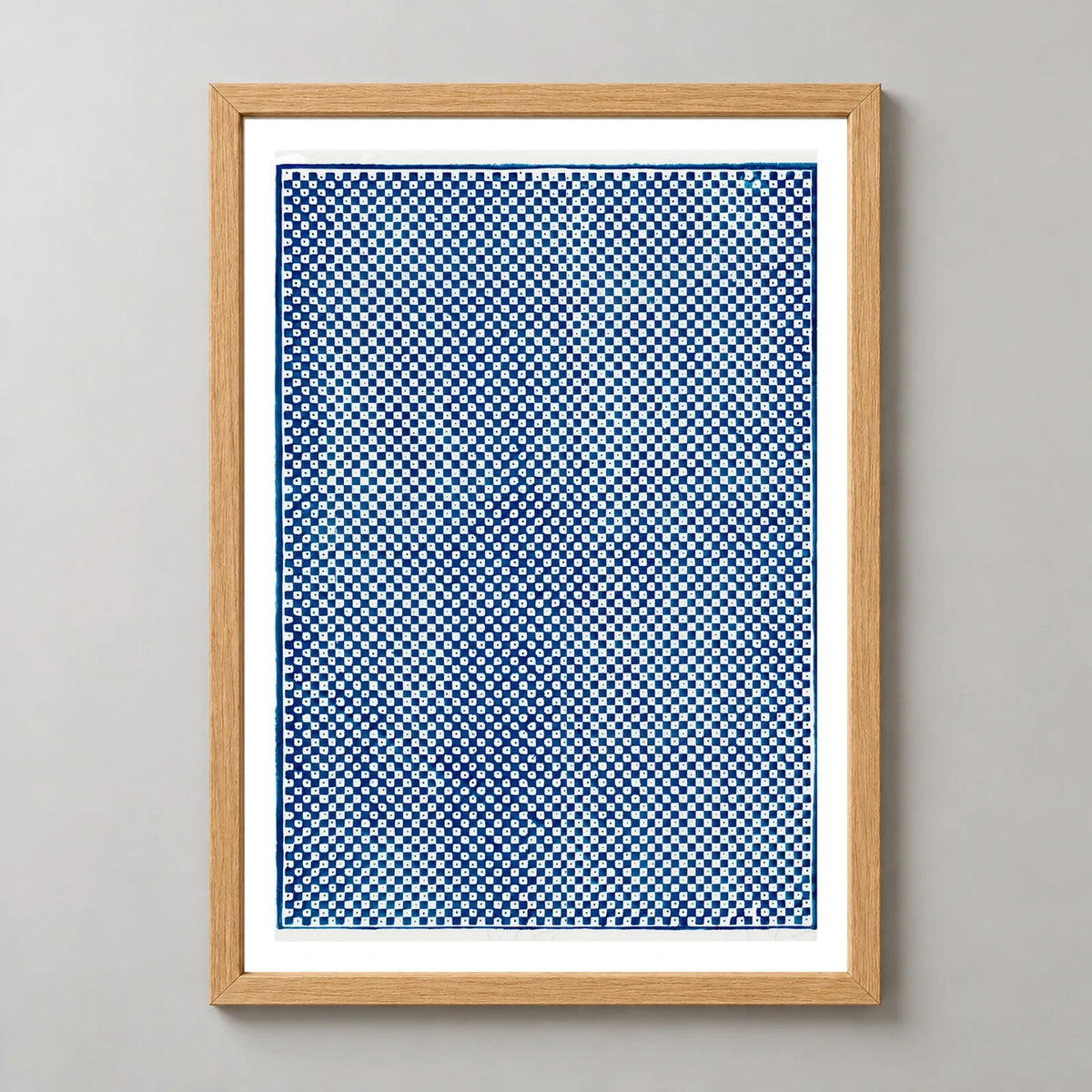 Blue Checkerboard Vintage Pattern Print by Pierre-Fiacre Perdoux in a natural wood frame, front view