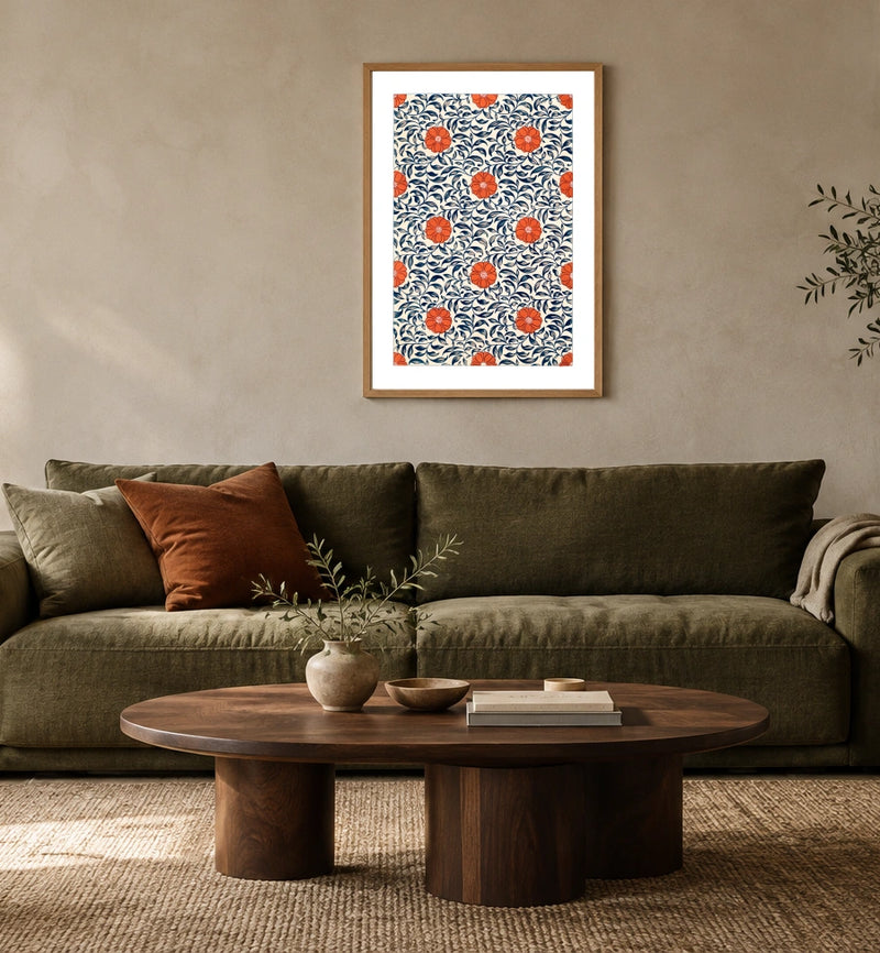 Chinese Ornament — Floral Plate in a natural wood frame above an olive sofa; styled living-room mockup