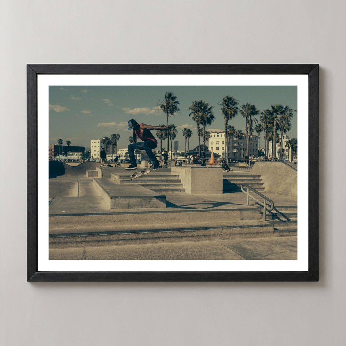 Skate Tricks | Skateboarding Photograph — realistic black frame studio view with white border