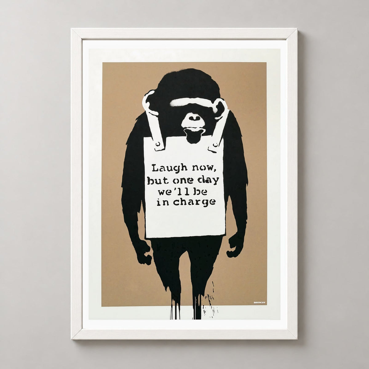 Banksy Laugh Now, 2003 — realistic white frame studio view