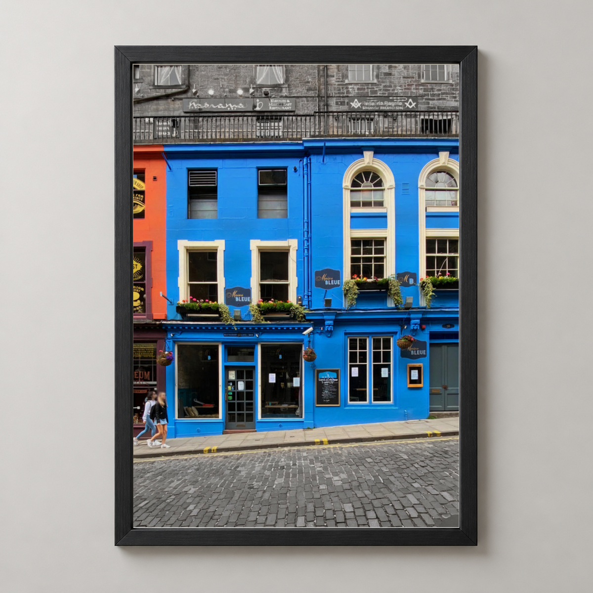 Vibrant Edinburgh Facades - Colorful Street Art Print — realistic black frame studio view