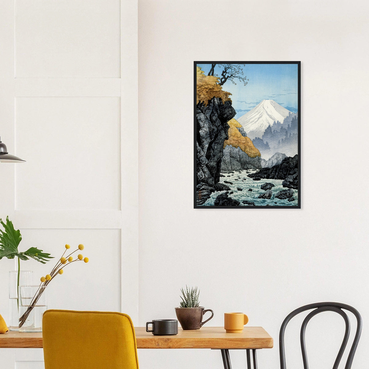 Foot of Mount Ashitaka in a black frame above a dining table; styled room mockup