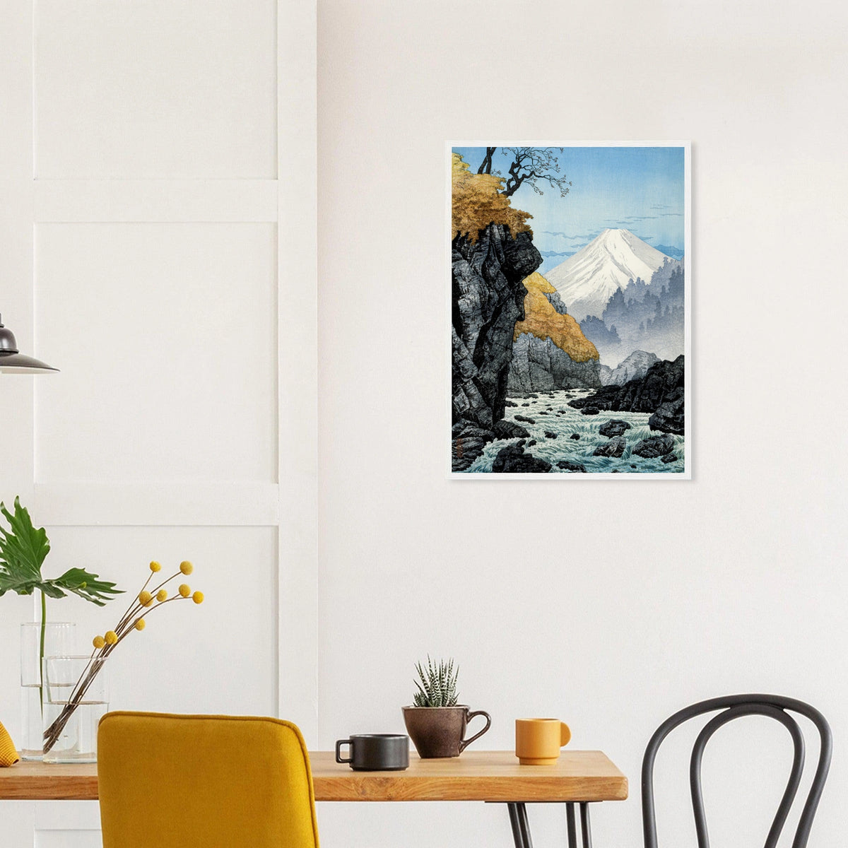 Foot of Mount Ashitaka in a white frame above a dining table; styled room mockup
