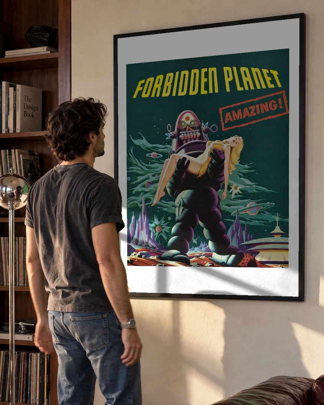 Forbidden Planet Vintage Movie Poster (1956) in a black frame; styled man setting.