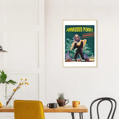 Forbidden Planet in a natural wood frame above a dining table; styled room mockup