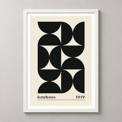 Bauhaus 1919 - Minimalist Geometric Art Print (Black) — realistic white frame studio view