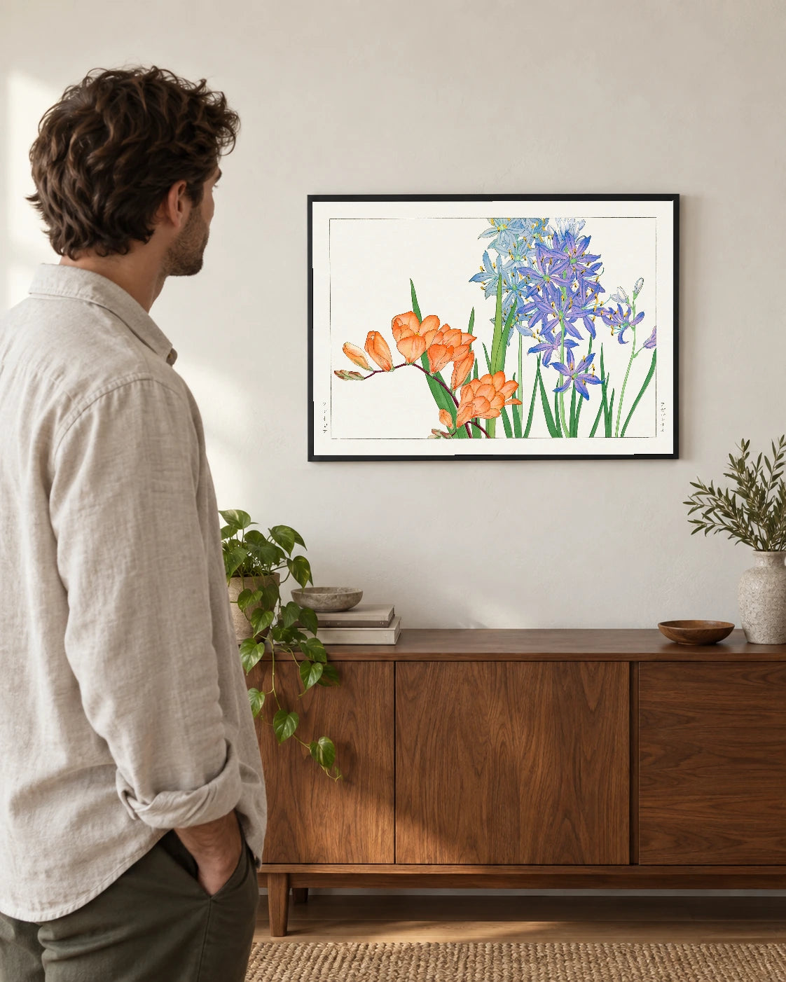 Orange and Blue Freesias — styled room visualisation in a black frame