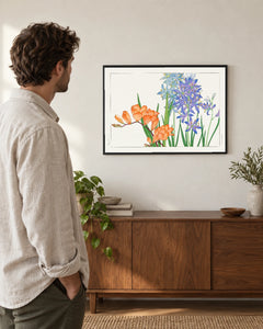Orange and Blue Freesias — styled room visualisation in a black frame
