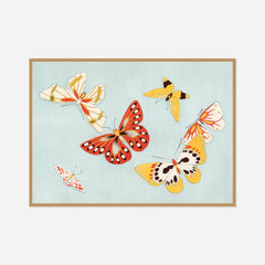 Golden Butterflies — front view in a natural wood frame