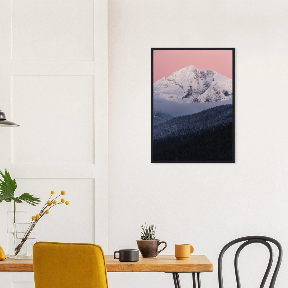 Gunsight Mountain at Dusk in a black frame above a dining table; styled room mockup