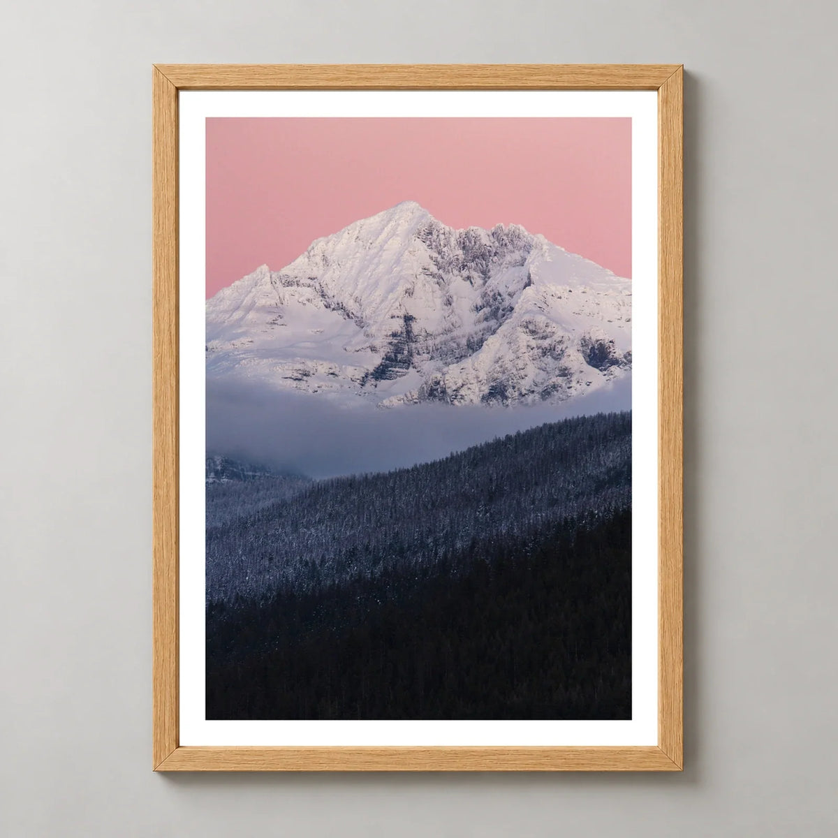 Gunsight Mountain at Dusk Photographic Print — realistic natural wood frame studio view with white border