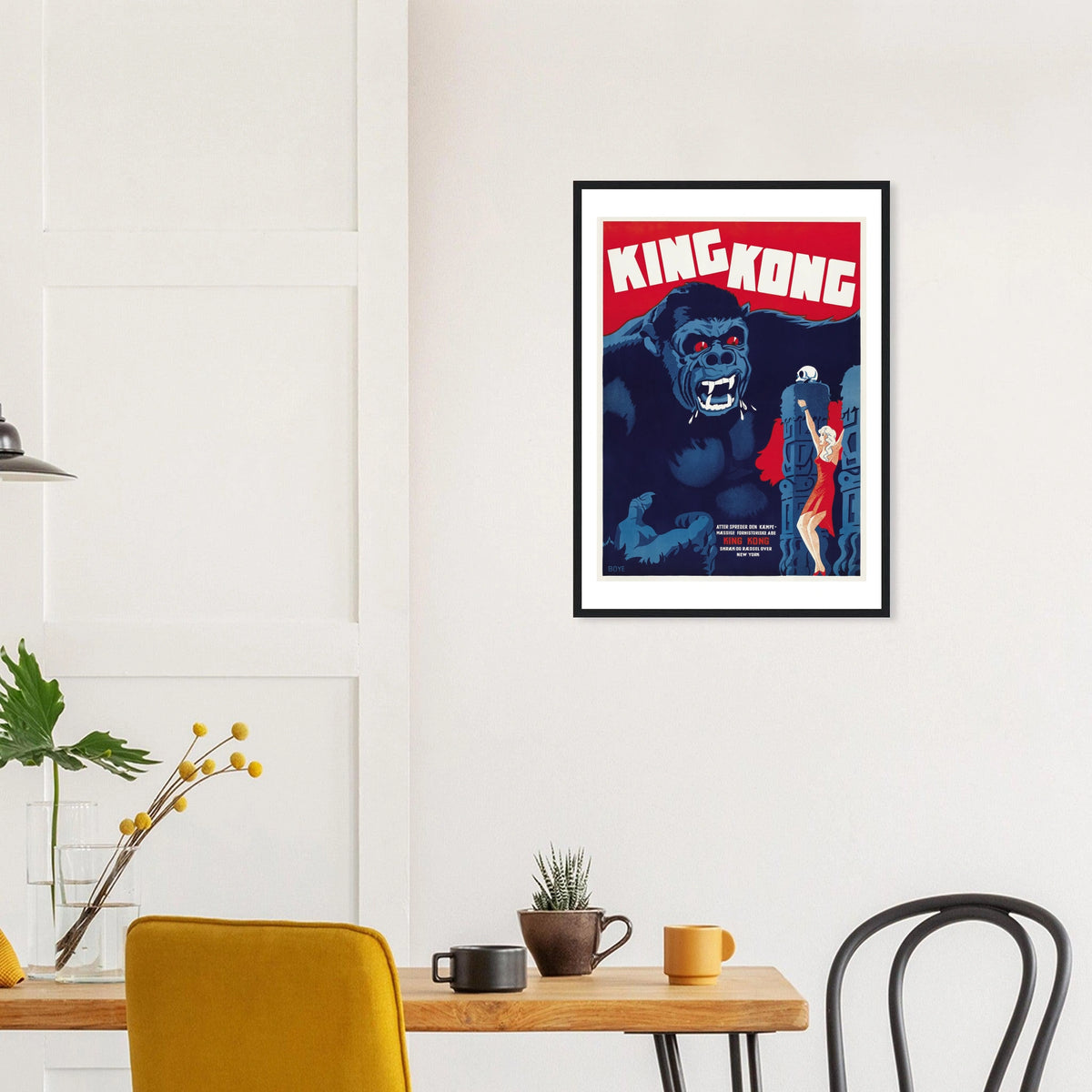 King Kong — Danish Poster in a black frame above a dining table; styled room mockup
