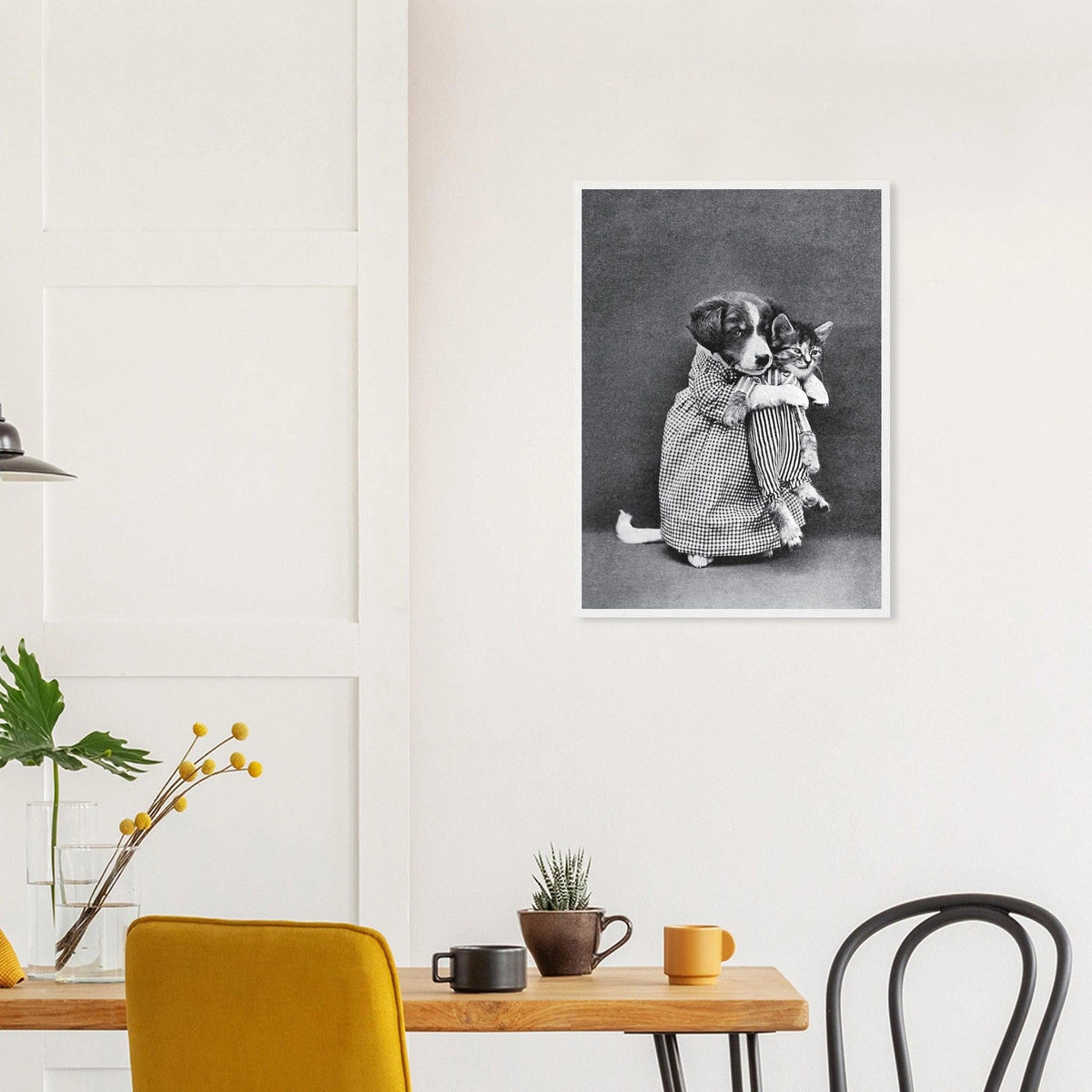 Miss Kindeyes in a white frame above a dining table; styled room mockup