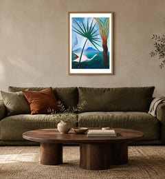 Neapolitan Song in a natural wood frame above an olive sofa; styled living-room mockup