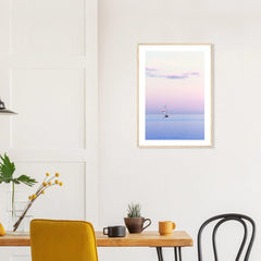 Pastel Sailing in a natural wood frame above a dining table; styled room mockup