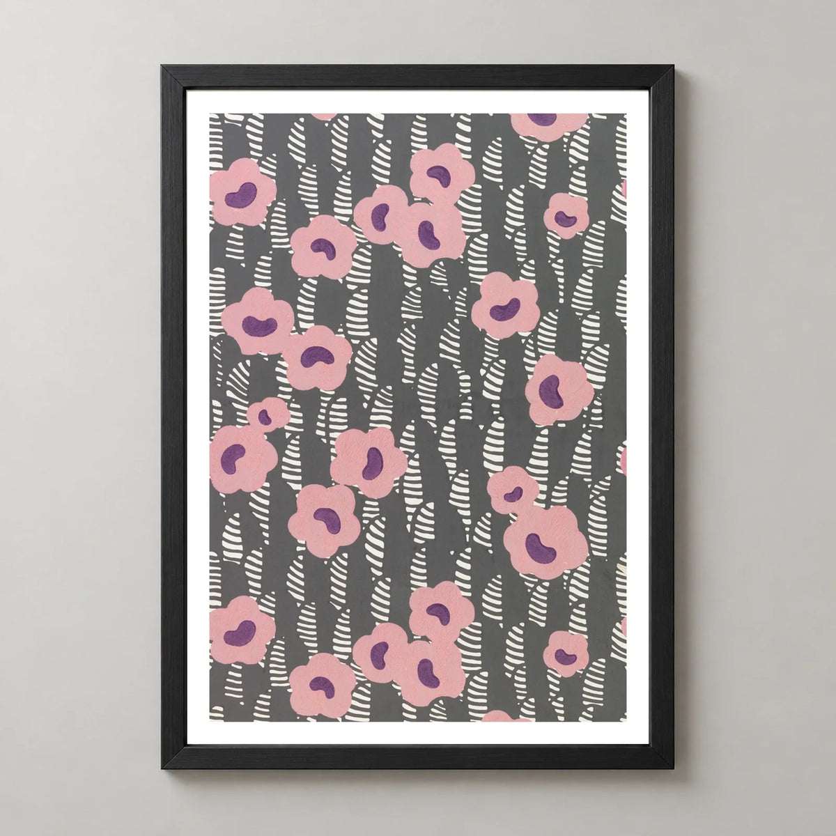 Pink Floral Sidewall Art Print by René Crevel in a black frame, front view