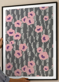 Pink Floral Sidewall Art Print by René Crevel in a black frame; close-up of the framed artwork.