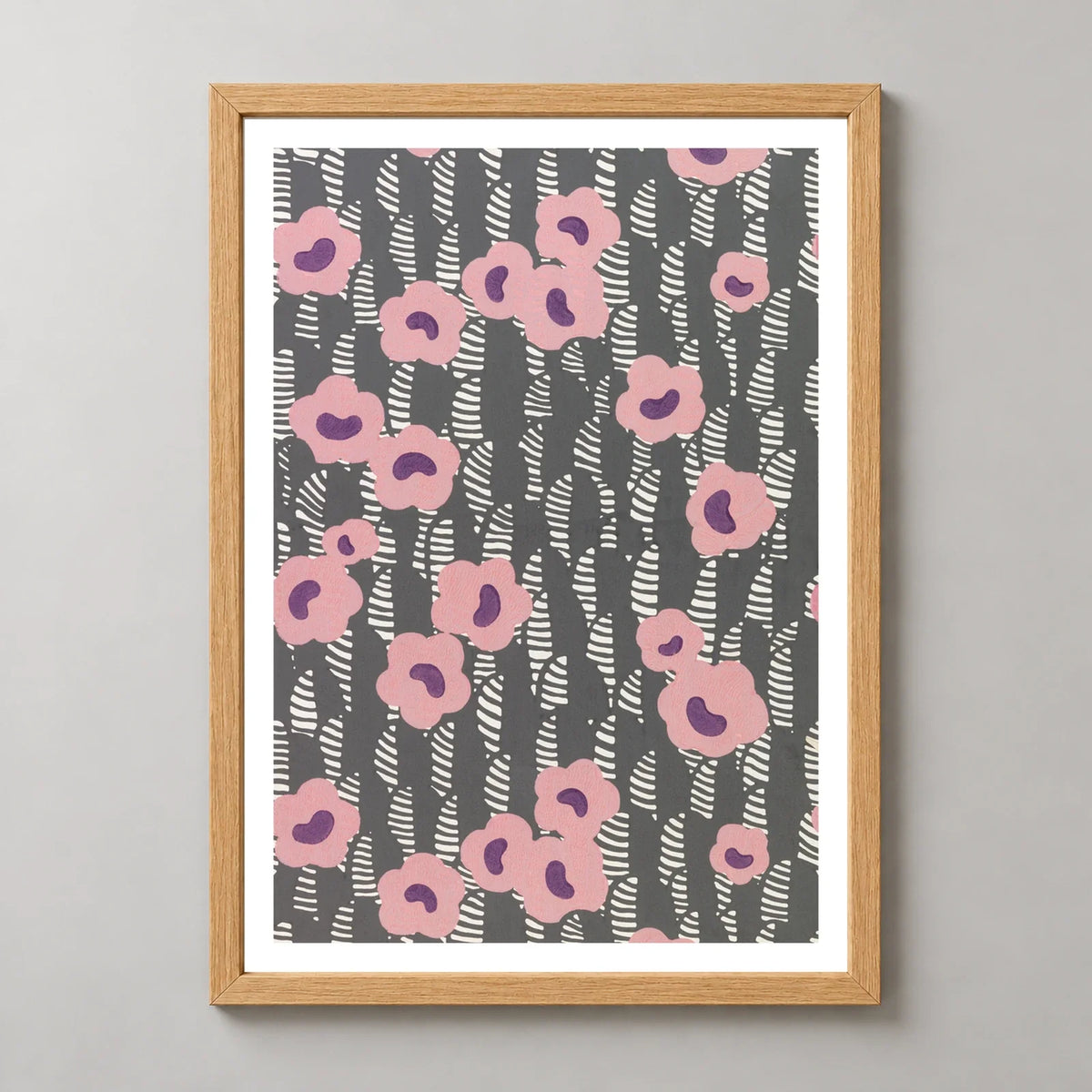 Pink Floral Sidewall Art Print by René Crevel in a natural wood frame, front view
