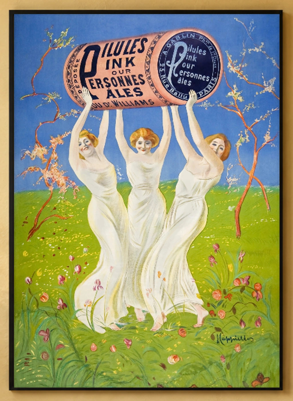 Pink Pills for Pale People Art Print by Leonetto Cappiello in a black frame; close-up of the framed artwork.