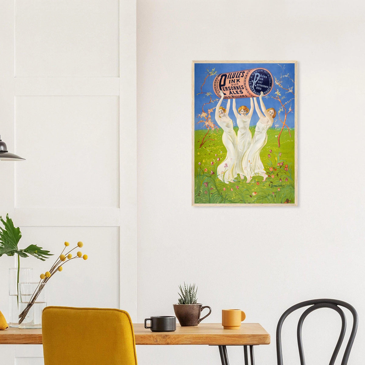 Pink Pills for Pale People in a natural wood frame above a dining table; styled room mockup