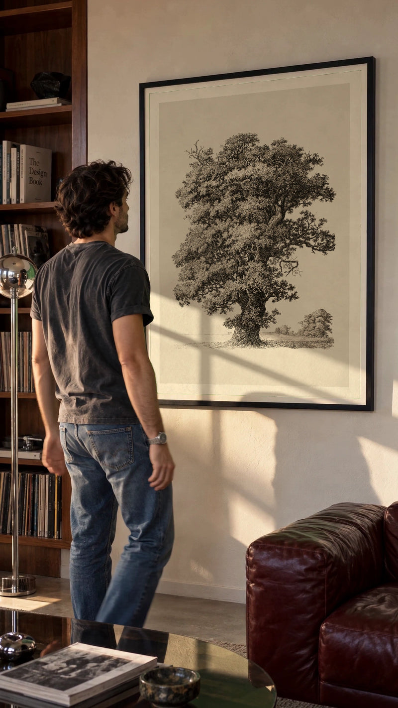 Studies after Nature — Tree in a black frame being hung on a wall; styled scene