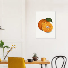 Tangerine Study in a white frame above a dining table; styled room mockup