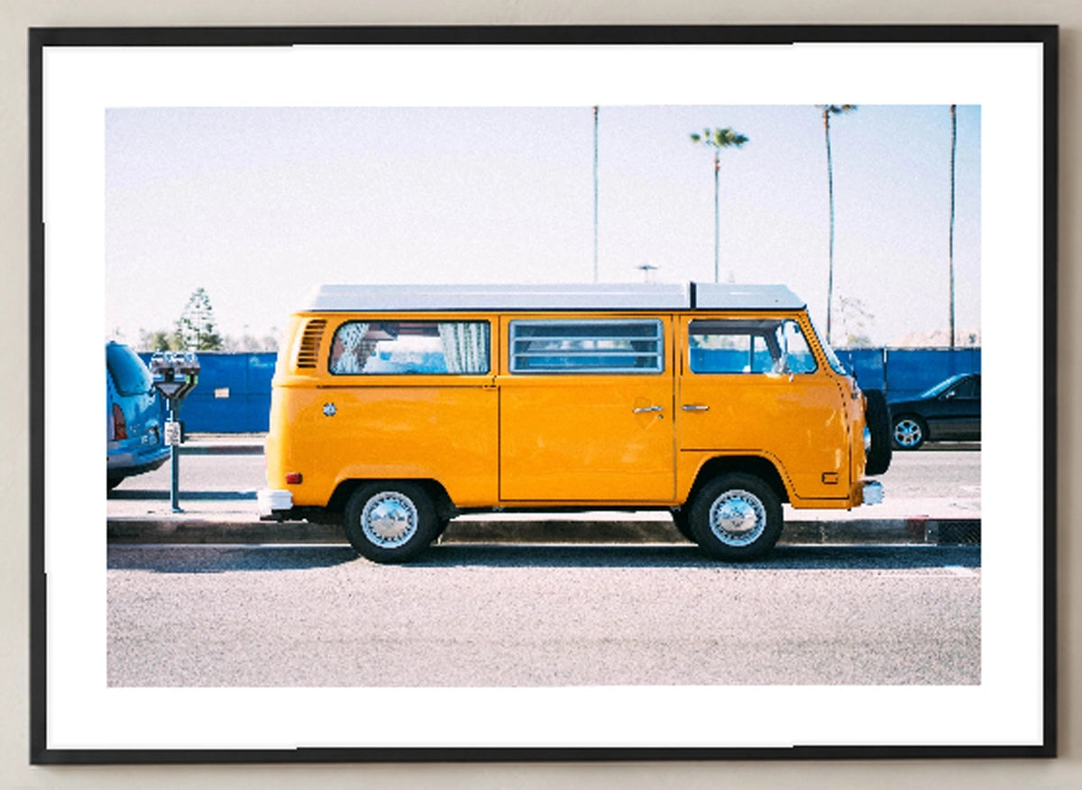 Yellow Van Coastal Photographic Print in a black frame; close-up of the framed artwork.