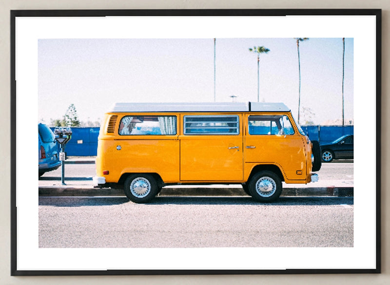 Yellow Van Coastal Photographic Print in a black frame; close-up of the framed artwork.