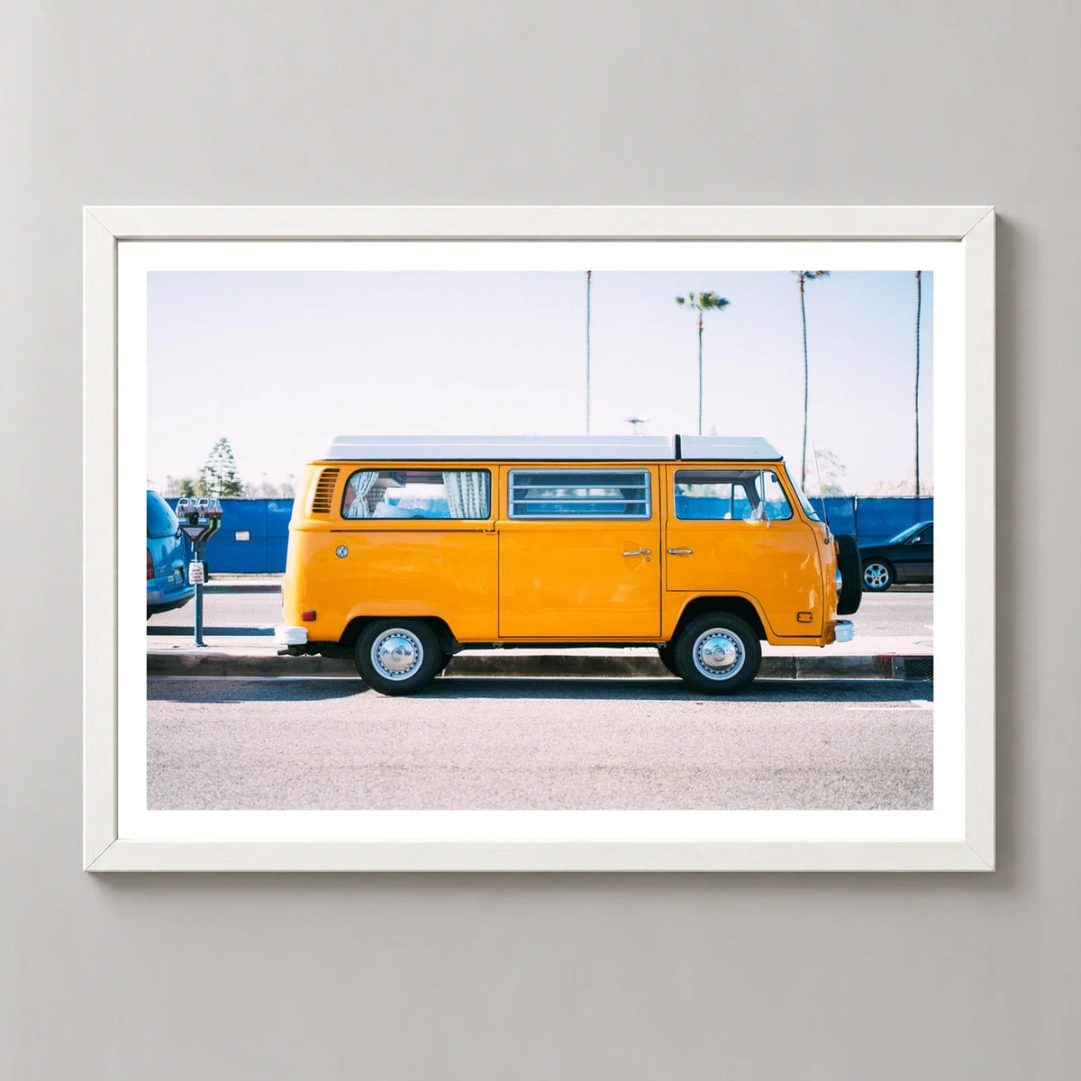 Yellow Van Coastal Photographic Print in a white frame, front view